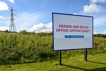 Large Sign Promoting Land For The Development And Building Of Offices. No People. Copy Space