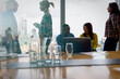 © Tom Merton/Caia Image - Business people working in conference room meeting