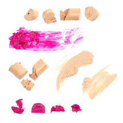 Set of different pieces of broken lipstick, pink and beige concealer, Makeup strokes, foundation texture isolated on a white background. Smears, broken pieces, debris.