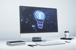 © Pixels Hunter - Creative light bulb with human brain hologram on modern laptop monitor, artificial Intelligence and neural networks concept. 3D Rendering