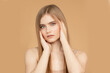 © Parilov - Beautiful portrait young woman on beige isolated background, skin and hair care Beauty face concept
