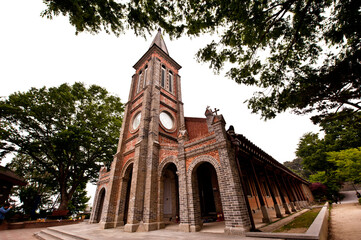 The catholic church building with cross.