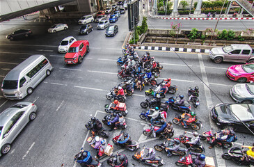 Chong nonsi, Bangkok, 16 April 2019, Motorcycles in traffic jam at the intersection. Group of Motorcycles jam in rush hour at the center of business district. Popular transports in modern city.