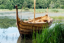 Old Wooden Viking Boat By The Lake