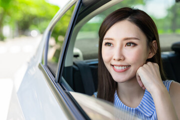 Wall Mural - business woman commute by taxi