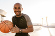 © Drobot Dean - Image of focused african american sportsman playing basketball