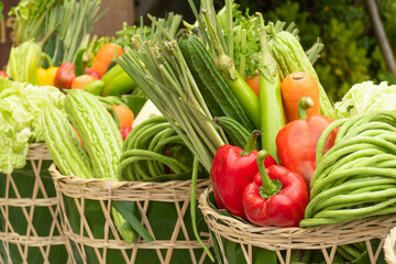 Fresh vegetables in the bamboo baskets