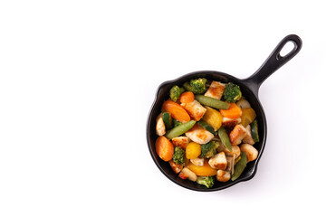 Wall Mural - Stir fry chicken with vegetables on iron pan isolated on white background. Top view