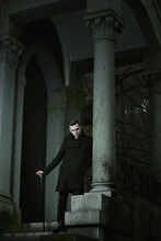 Aristocratic Vampire Waiting In A Stone Mausoleum