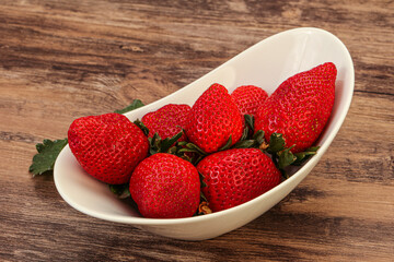 Ripe sweet strawberry with leaf