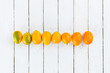 © SKC/Stocksy - Fresh Organic Kumquats in a Row