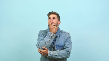 Wall Mural - Young caucasian handsome man doubting and confused, thinking of an idea or worried about something