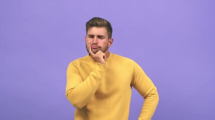 Wall Mural - Young caucasian handsome man doubting and confused, thinking of an idea or worried about something