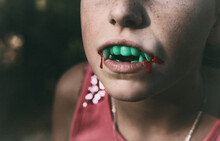 Young Girl With Fangs And Blood For Halloween