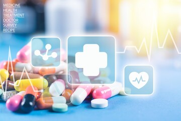 Wall Mural - Colorful pills and tablets with medical icons on background