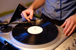 © Lyuba Burakova/Stocksy - Dj put on a vinyl