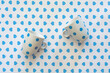 © Pixel Stories/Stocksy - Blue-dotted cups on blue hearts cloth