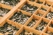 © MyMicrostock/Stocksy - Lead Press Types on a Wooden Box