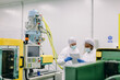 © BONNINSTUDIO/Stocksy - Two male engineer doing control quality checks in a factory.