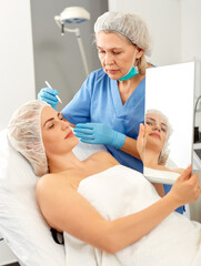 Woman getting ready for plastic surgery. High quality photo