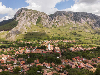 Wall Mural - Aerial shot of Rimetea town in an amazing mountain landscape in Transylvania, Romania