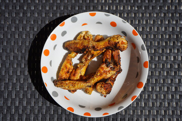 Sticker - Closeup shot of fried chicken in the plate