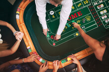 Casino: Dealer Making Payouts At Craps Table