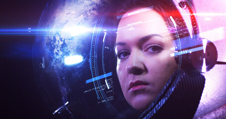 Wall Mural - young beautiful female astronaut in space helmet looking at camera. she is exploring outer space in 