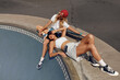 © puhhha - Subculture. Skater Girls Resting On Concrete Ramp At Skatepark. Hipsters In Casual Outfit With Modern Sport Equipment Outdoor. Summer Skateboarding As Part Of Active Urban Lifestyle.