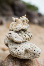 Piled Stones On The Beach