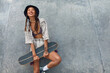 © puhhha - Skater Girl With Skateboard Portrait. Asian Teenager In Casual Outfit Against Concrete Wall At Skatepark. Urban Subculture And Skateboarding As Lifestyle Of Active Teens In City.