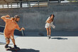 © puhhha - Skaters. Girl And Guy At Skatepark. Portrait Of Hipster Friends In Casual Outfit Riding On Skateboard Outdoors. Urban Subculture Style And Summer Extreme Sport In City. Skateboarding For Lifestyle.