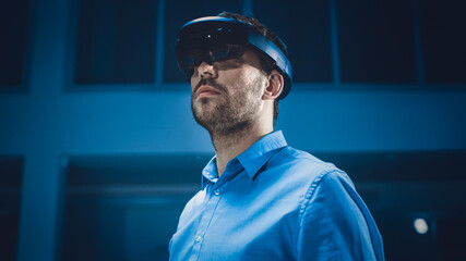 Aufkleber - In 3D Content Creating Laboratory Engineer Wearing Professional Virtual Reality Headset and Works in Augmented Reality. Stylish Low Angle Portrait Shot 
