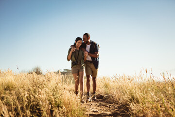 happy couple on hiking trail