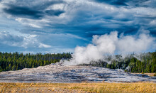 Eruption Of Old Faithful Geyser At Yellowstone National Park