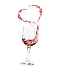 Romantic heart made from liquid in wine glass