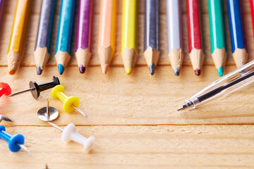 Wall Mural - office and school stationery supply over wooden desk. studio shot