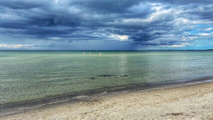 dramatic sky clouds over baltic sea