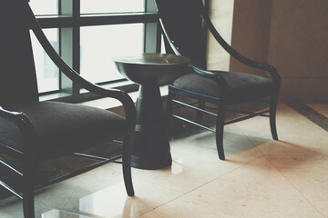 cushion wooden chair in living room.