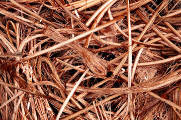 A scrap of old wired and sheet copper material from a recycling company in the purpose of wallpaper and background