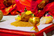 Coconut Decorate with Flower Spread Wheat Diya in Holly Pooja