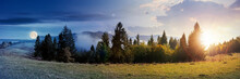 Day And Night Time Change Concept Of Foggy Autumn Panorama. Spruce Trees On The Meadow Beneath A Sun And Moon. Mountain Behind The Mist. Cloud Inversion Natural Phenomenon Observed From The Side