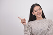 © somchaikhun - woman pointing.