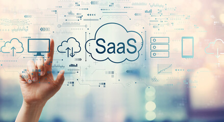 Wall Mural - saas - software as a service concept with hand pressing a button on a technology screen