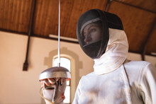 Woman Wearing Fencing Outfit 