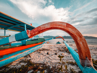 Wall Mural - Indonesian fishing boats on the beach at sunset, Gili Islands, Gili Trawangan