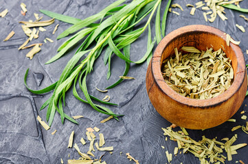 Wall Mural - Fresh and dry tarragon herbs