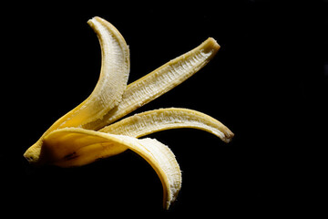 Golden Banana isolated on dark background.