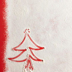 Wall Mural - Christmas tree on flour background. White flour looks like snow. Top view