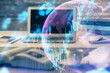 © peshkova - Multi exposure of graph and financial info and work space with computer background. Concept of international online trading.